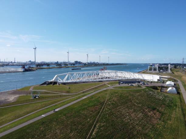 istock White structure and wind turbines on a sunny morning 1446836069