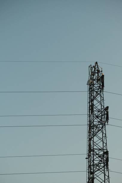 istock Vertical shot of the base station on a blue sky background 1446836458