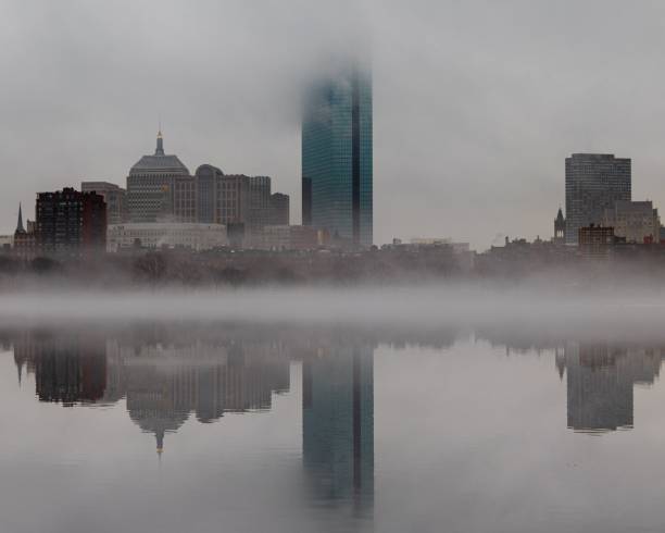 istock Boston skyline at sunrise with river reflections 1446838288