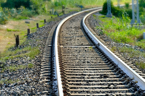 a selective focus closeup of railroad tracks