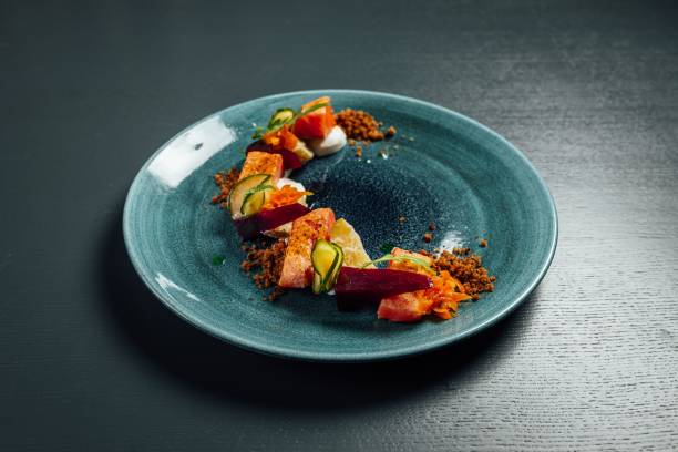 istock Fresh and beautiful slow cooked salmon on dark blue background 1446839359