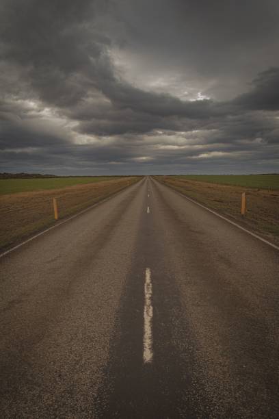 istock Roadway on a moody dark day 1446839384