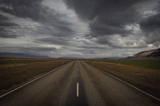istock Roadway on a moody dark day 1446839415