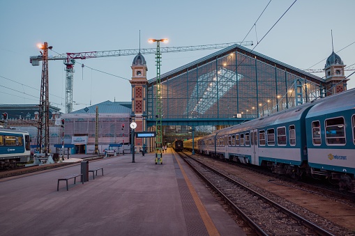 Budapest, Hungary – June 29, 2022: A Train at Nyugati Railway Station in the evening, Budapest, Hungary