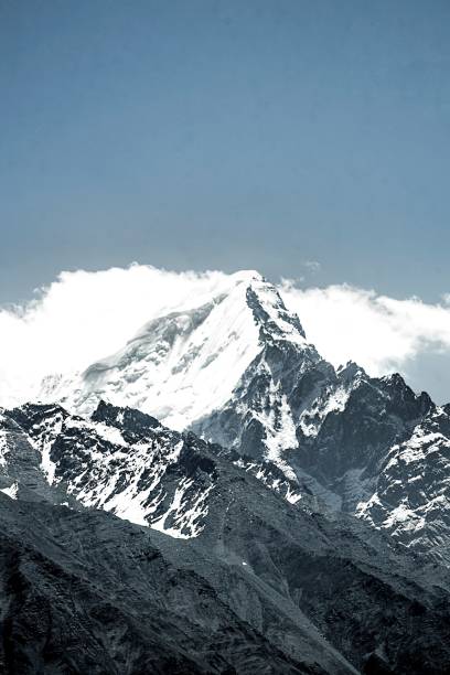 istock View of the snowy mountains and clouds 1446844545