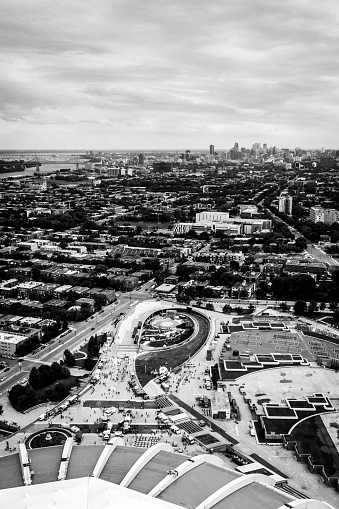 A grayscale cityscape of Montreal, Canada