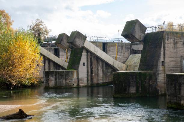 istock Dam in the black river in the industrial area 1446849310