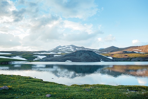 A scenic view of Stone lake with Aragats mountain in the background in Armenia