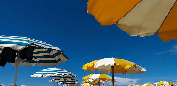 Colored beach umbrella photographed from below...