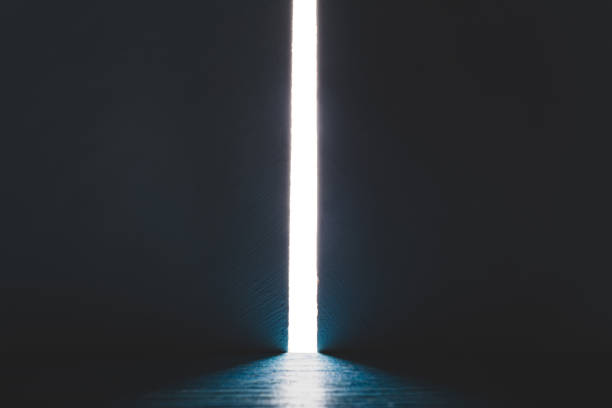 istock Bright light between two walls. Light from the opening large stone gate, portal. A light in the end of a tunnel. The concept of success, freedom of choice, open mind, meditation. 1446853905