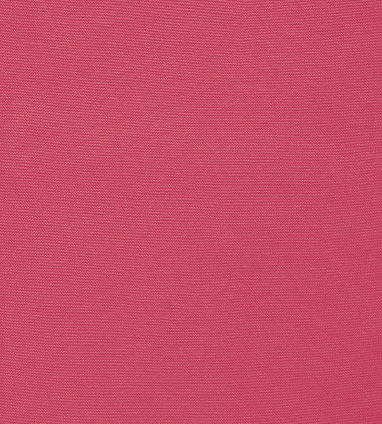 istock Texture of smooth knitted sweater with pattern. Handmade knitting wool or cotton fabric texture. Background of Large knit pattern with knitting needle or crochet. Color Of The Year 2023 - Viva Magenta 1446857336