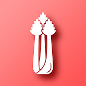 istock Celery. Icon on Red background with shadow 1446859735