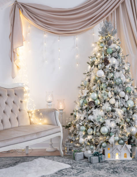 istock Luxury Christmas decorated tree in beautiful apartment 1446860862