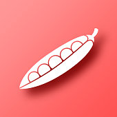 istock Pea. Icon on Red background with shadow 1446861603