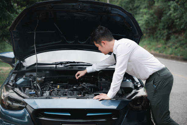 istock Asian businessman car broken breakdown 1446862585