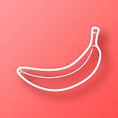 istock Banana. Icon on Red background with shadow 1446863369