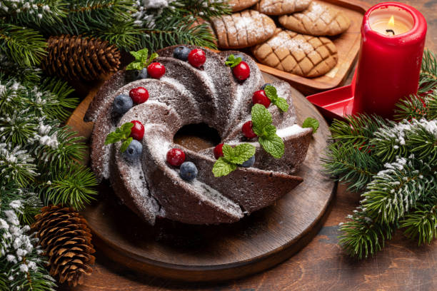 Christmas cake with blueberries, cranberries and mint