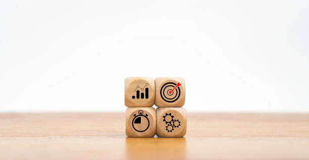 istock business strategy, Action plan, Goal and target, stack woods block step on table with icon about business strategy and Action plan. business development concept. copy space. 1446863964