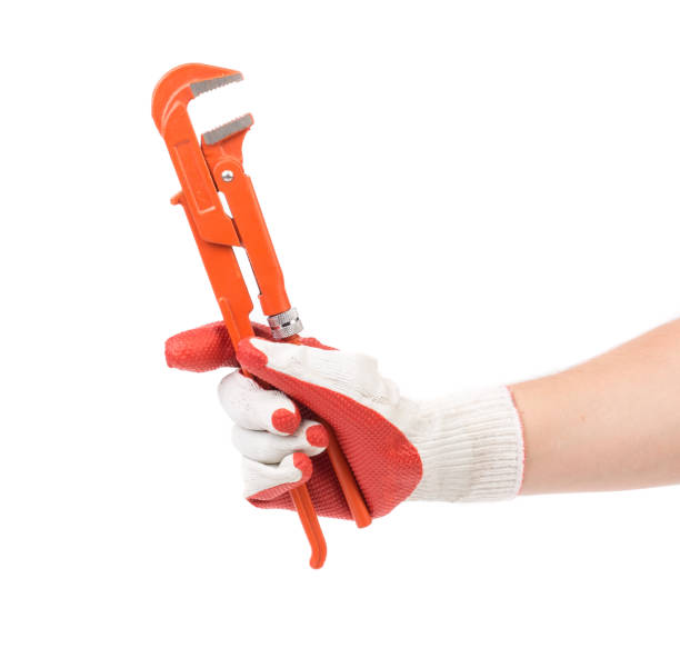 istock A gloved hand holds a gas wrench. 1446864885