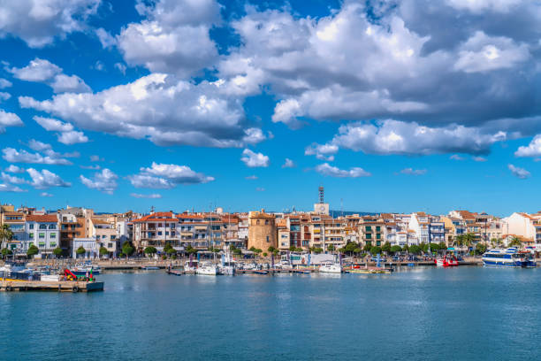 Cambrils seafront Spain boats and buildings Tarragona Province Catalonia Mediterranean sea and sky stock photo