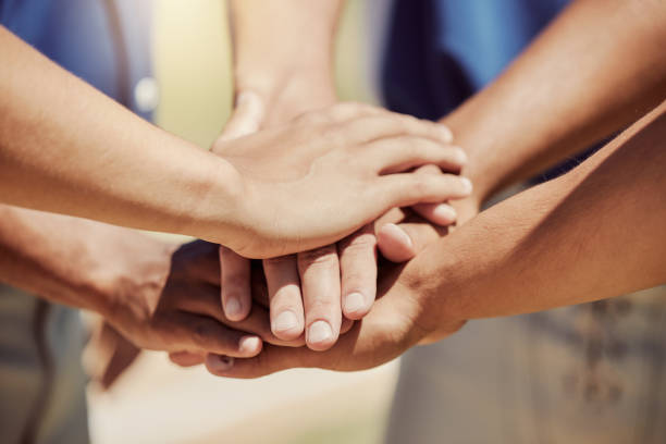 istock Closeup, hands and stack for sport, outdoor and baseball with group for teamwork, motivation and together. Softball, circle and hand for sports, fitness and focus in goal, team and planning at game 1446867576