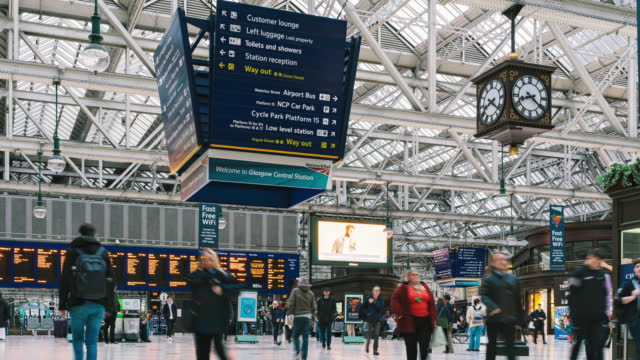 Time lapse of Crowded Commuter people in Glasgow Central station in downtown district of Glasgow