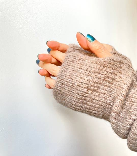 istock Cold day Arm warmer and glitter nails 1446871086
