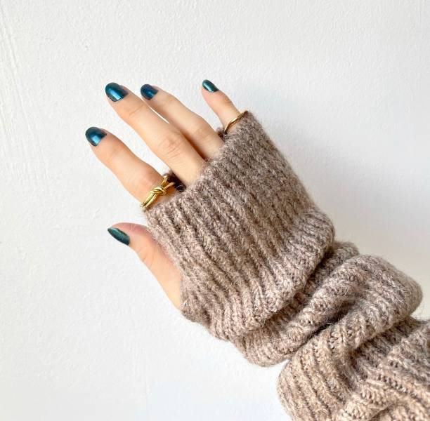 istock Cold day Arm warmer and glitter nails 1446871211