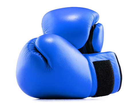 Pair of blue leather boxing gloves isolated on white background