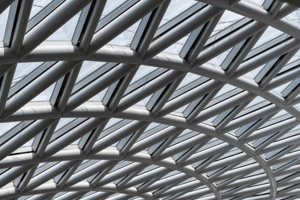istock Triangle pattern of building glass roof structure. Architectural glass roof structure with a geometric triangle pattern. 1446874967