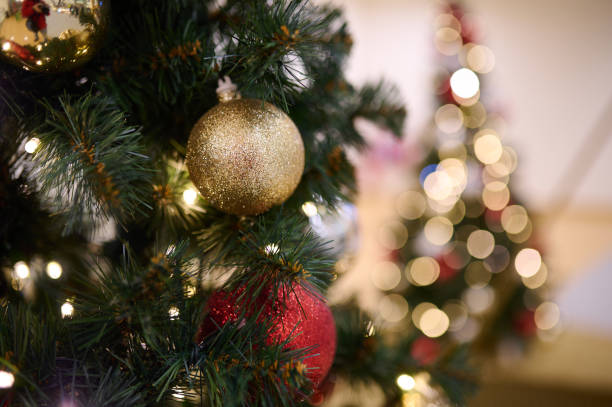 istock Christmas tree with gold decoration in shopping mall. 1446875492