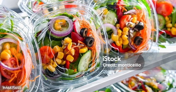 istock Boxes with pre-packaged vegetable salads in a commercial fridge 1446875650
