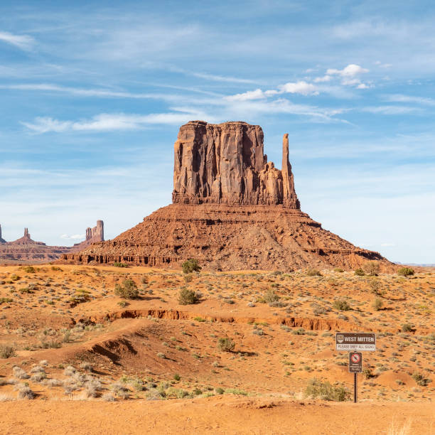 istock scenic view to monument valley with butte and blue sky 1446879032
