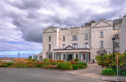 Malahide, Ireland - September 15 2022: The facade of the Grand Hotel Malahide, an iconic luxurious seaside hotel.