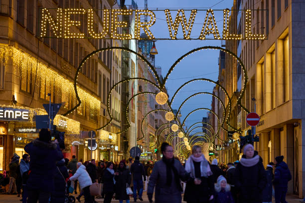 Neuer Wall shopping street decorated for Christmas. One of many streets with Christmas decorations in Hamburg. A popular place to take a picture of the Christmas ulluminated street