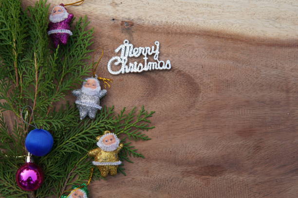 istock Christmas decorations with copy space on wooden background. 1446881133