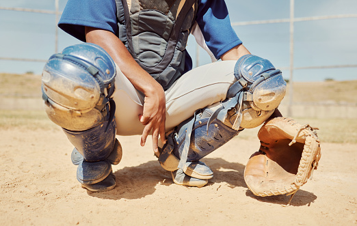Baseball, sports and hands of a man with a sign during a game, competition or event on a field. Professional athlete waiting for the ball during sport with gear in nature, park or natural environment
