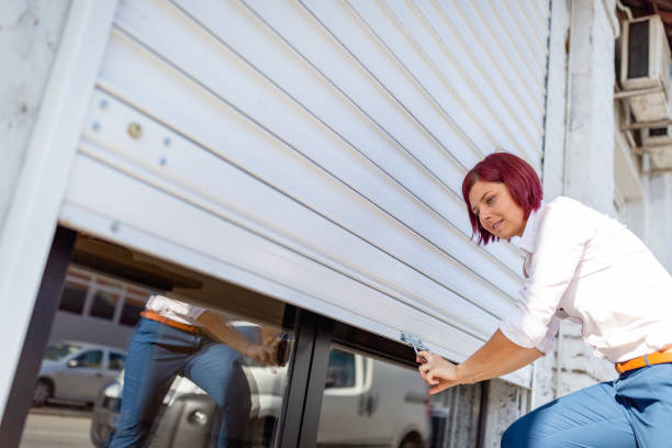 Bakery owner closing the store stock photo