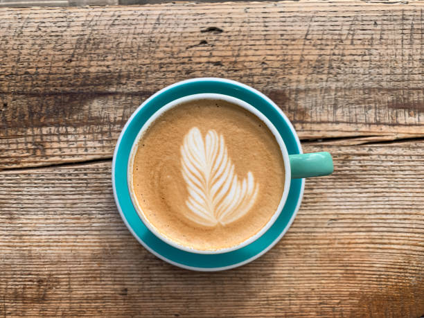 istock A cup of coffee latte on a wooden table 1446885404