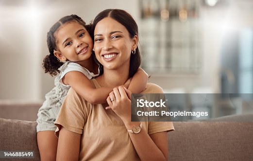 istock Black family, hug and portrait of child with mother, mom or mama bond, relax and enjoy quality time together. Love, happy family and woman with kid girl smile, care or lounge on home living room sofa 1446885491