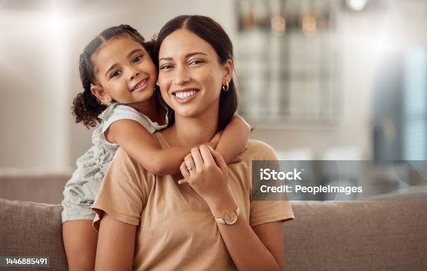 Black Family Hug And Portrait Of Child With Mother Mom Or Mama Bond Relax And Enjoy Quality Time Together Love Happy Family And Woman With Kid Girl Smile Care Or Lounge On Home Living Room Sofa Stock Photo - Download Image Now