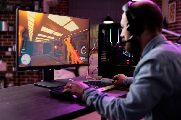 istock Caucasian player enjoying live stream with video games 1446885564