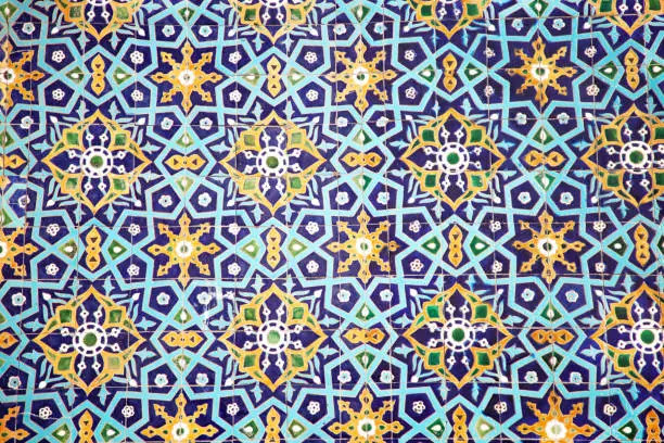 Photo of Traditional uzbek pattern on the ceramic tile on the wall of the mosque