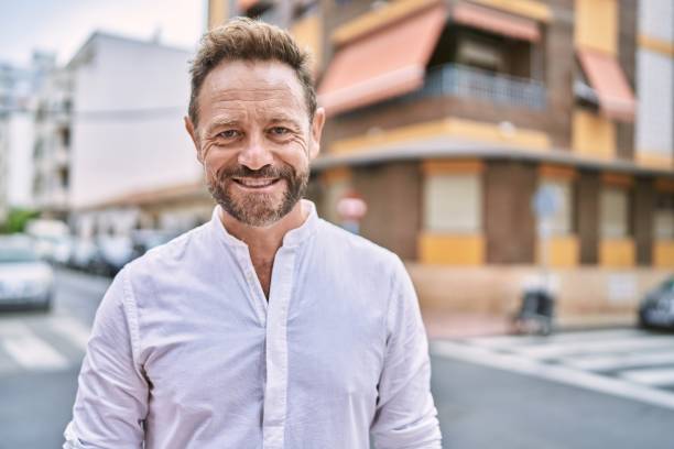istock Middle age man smiling confident at the city 1446891446
