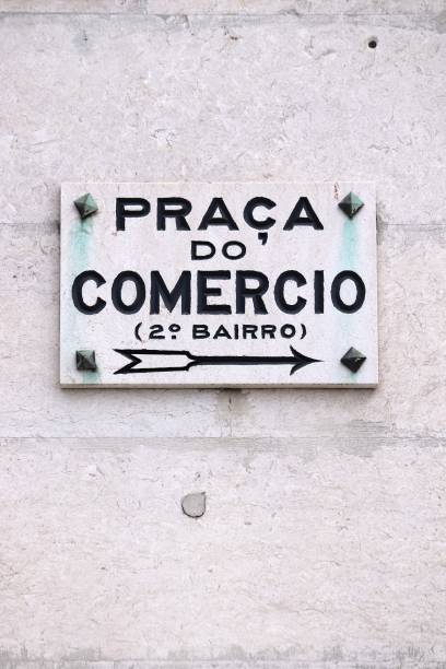 Praca do Comercio landmark square name sign in Lisbon, Portugal.