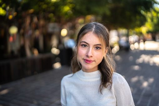 Portrait of young woman outdoors