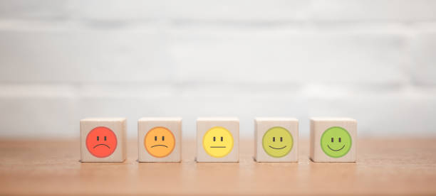 istock Wooden cube with icon emotion face, Satisfaction survey concept. customer experience, best excellent services, business services rating, Increase rating review, feedback survey evaluation, 1446896435