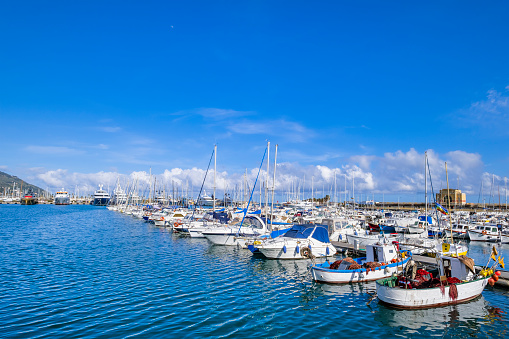 Fishing boats and yachts moored at the marina of Imperia, a city located in Ponente Ligure