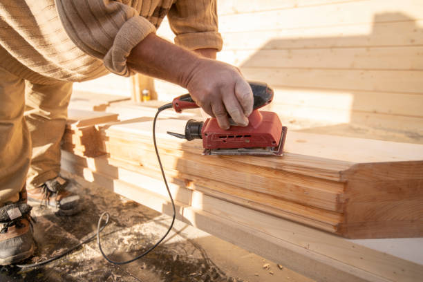 istock Close-up of worker grinding wooden plank. 1446899667