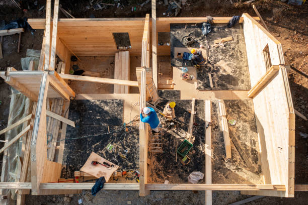 istock Buliding a wooden house. 1446899687
